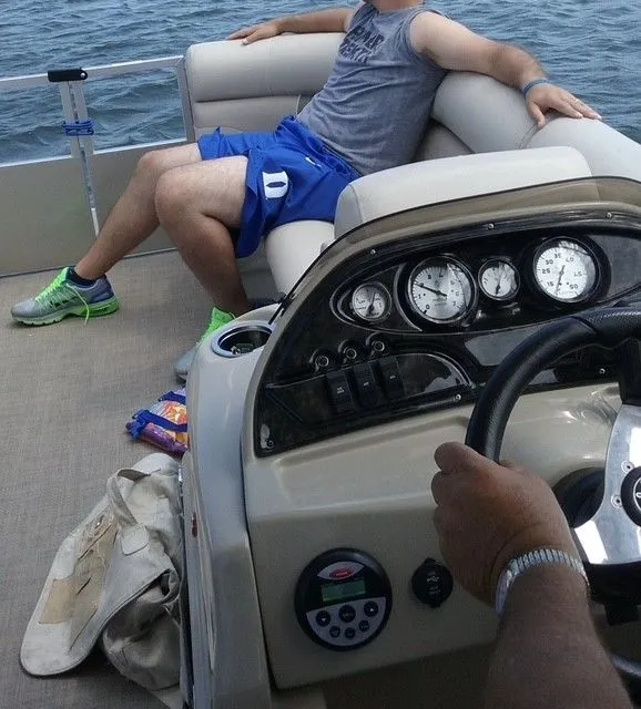 Slide: The Image of People relaxing on a 2014 JC MFG SPIRIT 223TT FISH boat. - 4