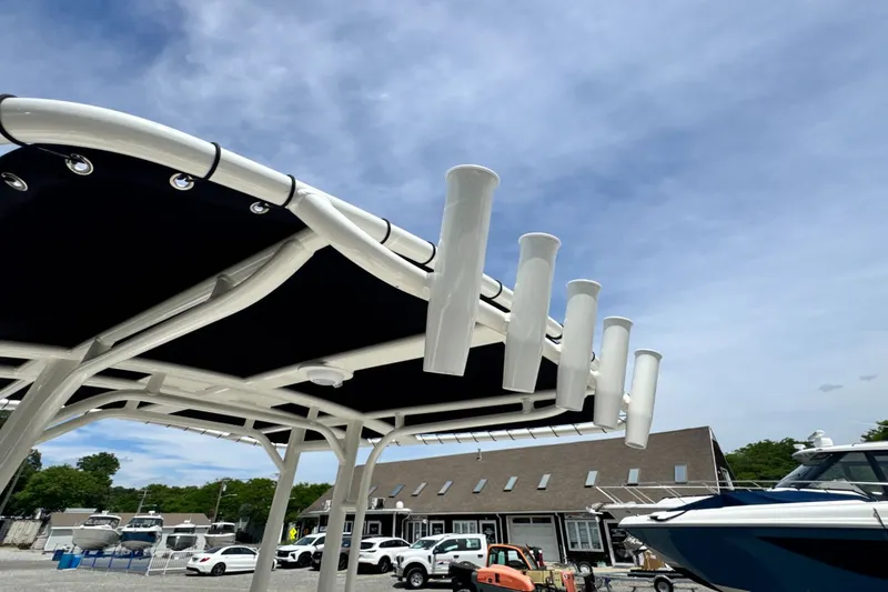 Slide: The Image of View of a Boston Whaler 190 Montauk roof with fishing rod holders. - 15