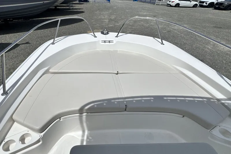 Slide: The Image of Bow area of a Boston Whaler 190 Montauk with cushioned seating. - 21