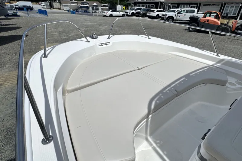 Slide: The Image of Bow area of a Boston Whaler 190 Montauk with cushioned seating. - 23