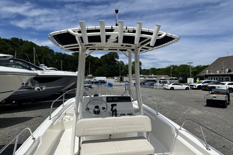 Slide: The Image of Boston Whaler 190 Montauk 2026 with T-top and open helm console. - 6