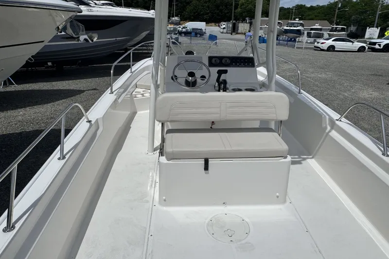 Slide: The Image of The image shows the cockpit of a 2026 Boston Whaler 190 Montauk. - 7