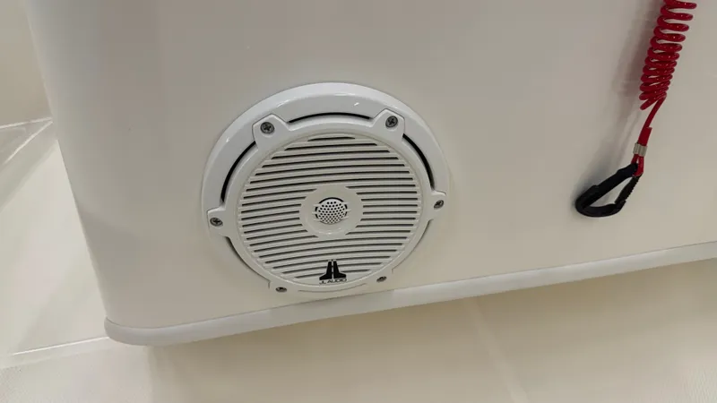 Slide: The Image of Close-up of a speaker on a 2026 Boston Whaler 150 Montauk. - 23