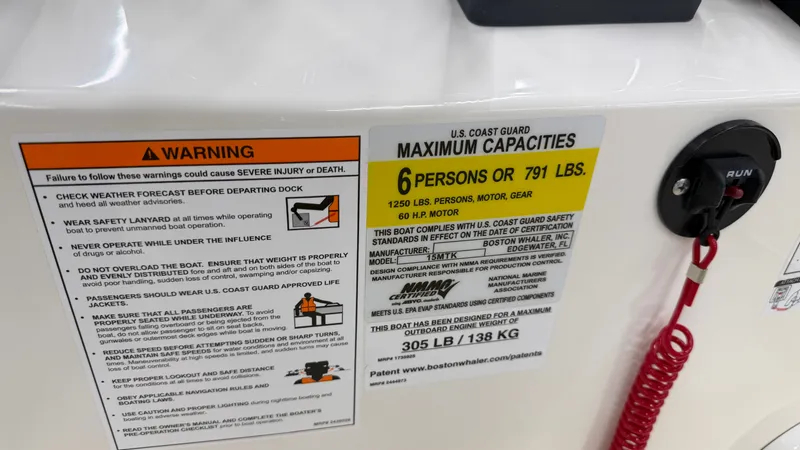 Slide: The Image of Safety and capacity labels on a boat, accommodating 6 persons or 791 pounds. - 24