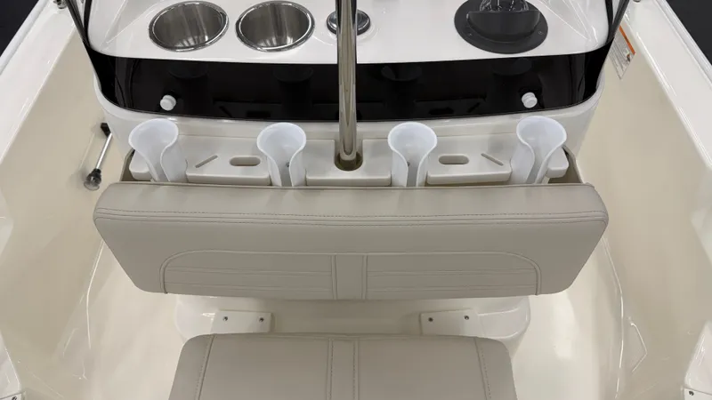 Slide: The Image of Interior view of a Boston Whaler 150 Montauk with seating and cup holders. - 34