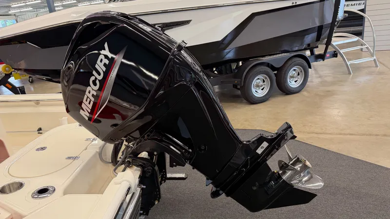 Slide: The Image of A 2026 Boston Whaler 150 Montauk with a Mercury outboard motor. - 9