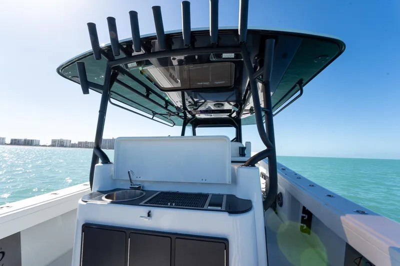 Slide: The Image of 2024 Yellowfin 42 Offshore boat with sleek design on open water. - 27