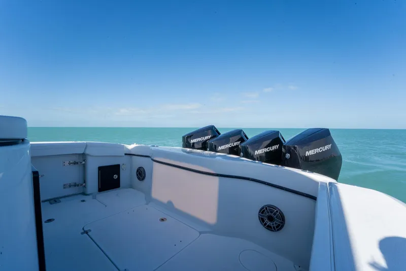 Slide: The Image of 2024 Yellowfin 42 Offshore boat with Mercury engines on open sea. - 29