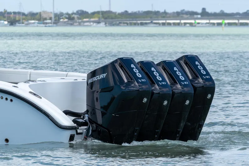 Slide: The Image of 2024 Yellowfin 42 Offshore with four Mercury 400 V10 outboard engines on water. - 7