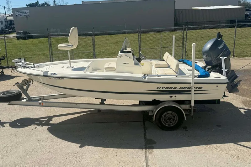 Slide: The Image of 2010 Hydra-Sports Bay Bolt 19 boat on trailer, parked outdoors. - 4