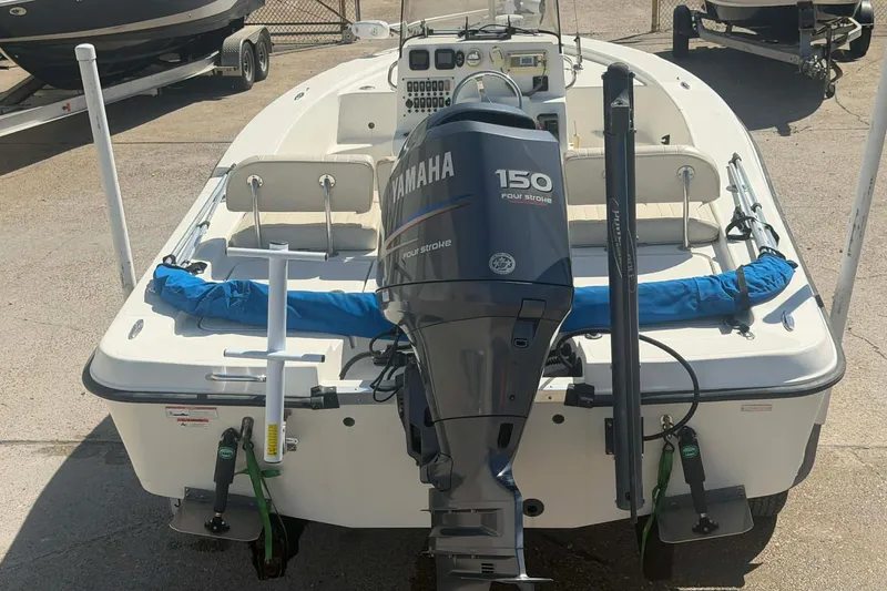 Slide: The Image of 2010 Hydra-Sports Bay Bolt 19 boat with Yamaha 150 four-stroke engine, docked outdoors. - 6