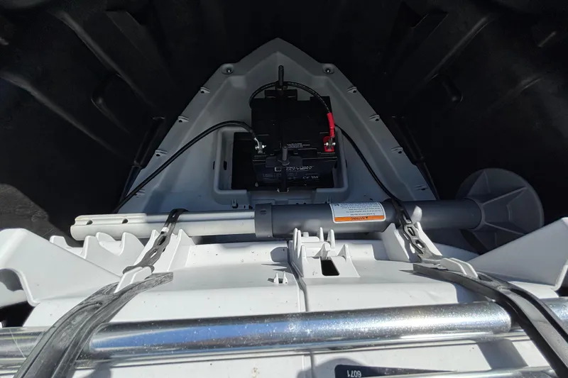 Slide: The Image of 2023 Sea-Doo Switch Cruise 21 pontoon boat interior with spacious seating and modern controls. - 24