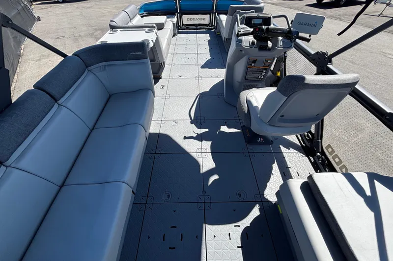 Slide: The Image of 2023 Sea-Doo Switch Cruise 21 interior with spacious seating and modern controls. - 26