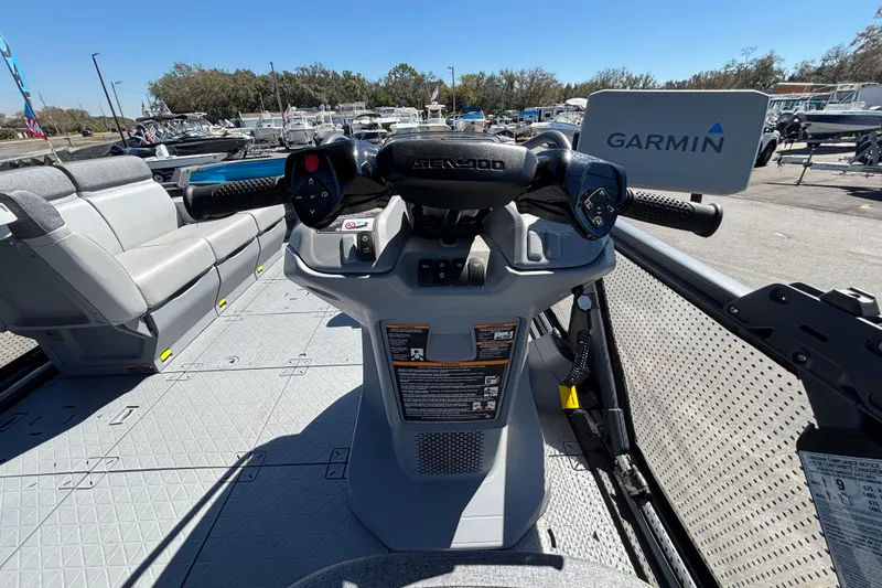 Slide: The Image of 2023 Sea-Doo Switch Cruise 21 interior with steering console and seating arrangement. - 33