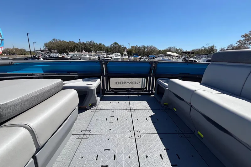 Slide: The Image of 2023 Sea-Doo Switch Cruise 21 interior with spacious seating and open deck. - 46