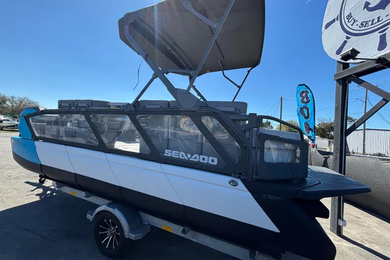 Slide: The Image of 2023 Sea-Doo Switch Cruise 21 engine compartment with safety warning labels. - 5