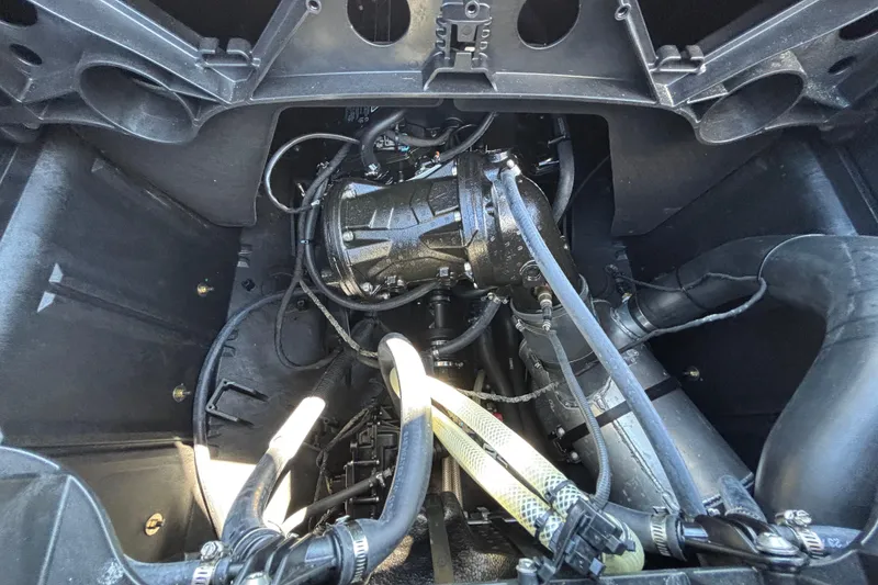 Slide: The Image of Engine compartment of 2023 Sea-Doo Switch Cruise 21, showcasing intricate mechanical components. - 57