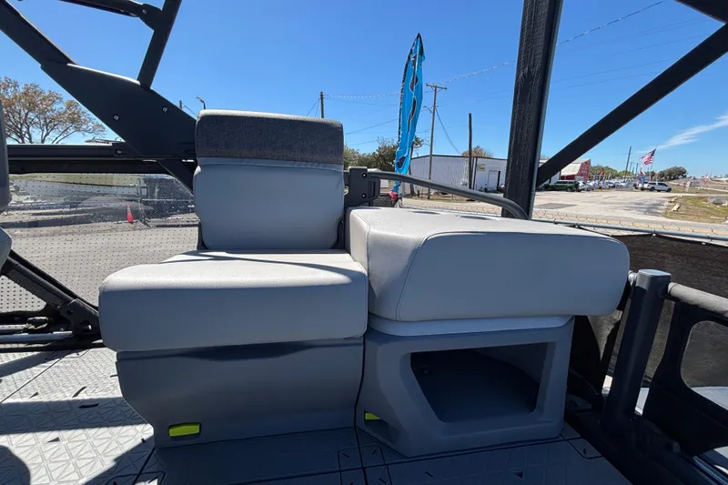 Slide: The Image of 2023 Sea-Doo Switch Cruise 21 table with integrated cup holders and seating. - 80