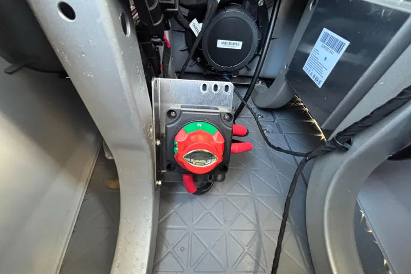 Slide: The Image of 2023 Sea-Doo Switch Cruise 21 battery switch and wiring detail. - 91