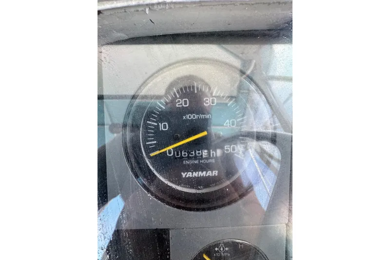 Slide: The Image of Close-up of a Yanmar engine hour meter on a 1963 Bertram 31 Sportfisher. - 15