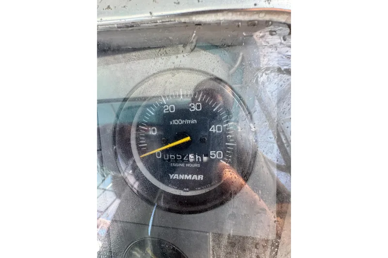 Slide: The Image of Close-up of a Yanmar tachometer on a 1963 Bertram 31 Sportfisher boat. - 16