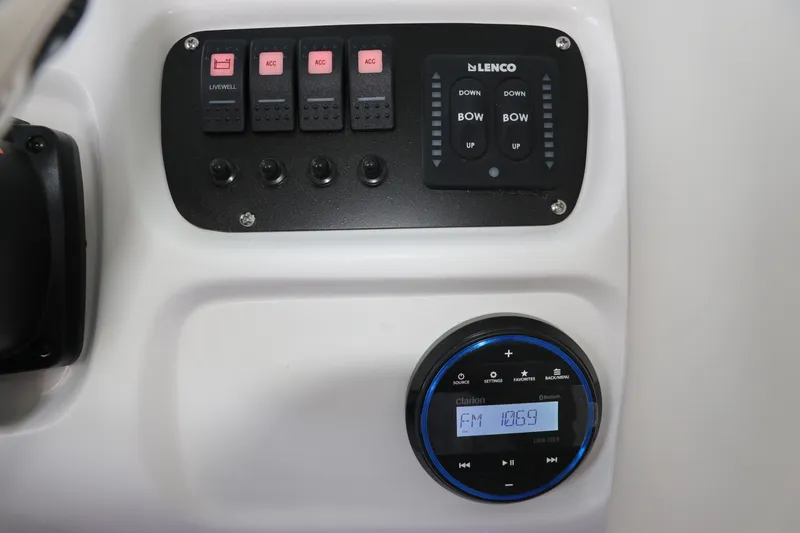 Slide: The Image of Control panel of 2026 Robalo R207 Dual Console with switches and radio display. - 20