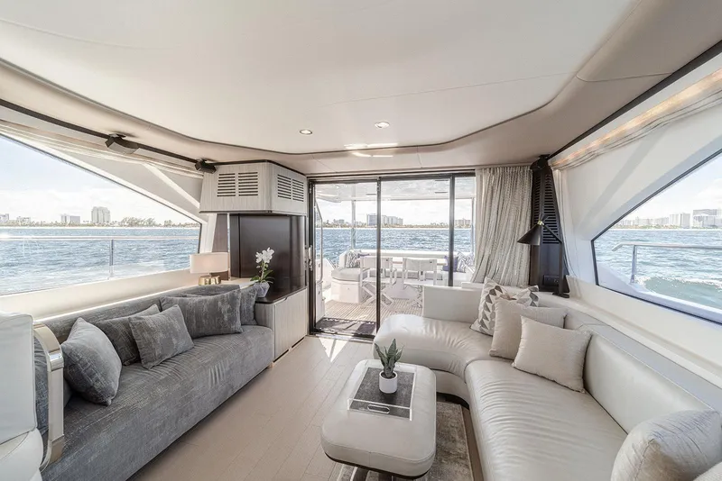 Slide: The Image of Luxurious interior of 2020 Azimut 60 yacht with elegant seating and ocean view. - 22