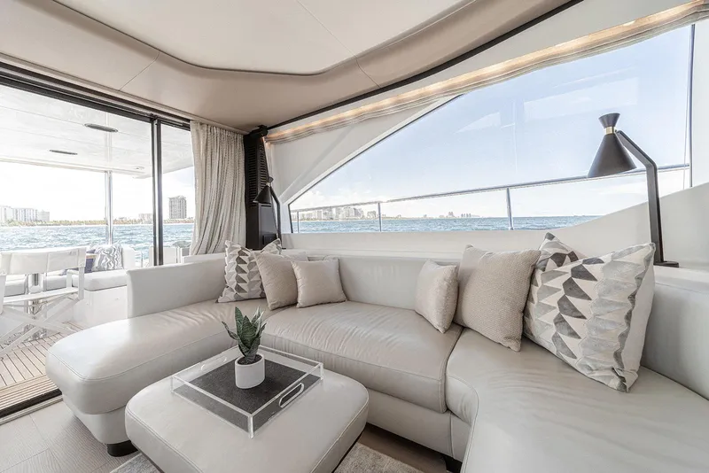 Slide: The Image of Luxurious interior of 2020 Azimut 60 yacht with elegant seating and ocean view. - 23