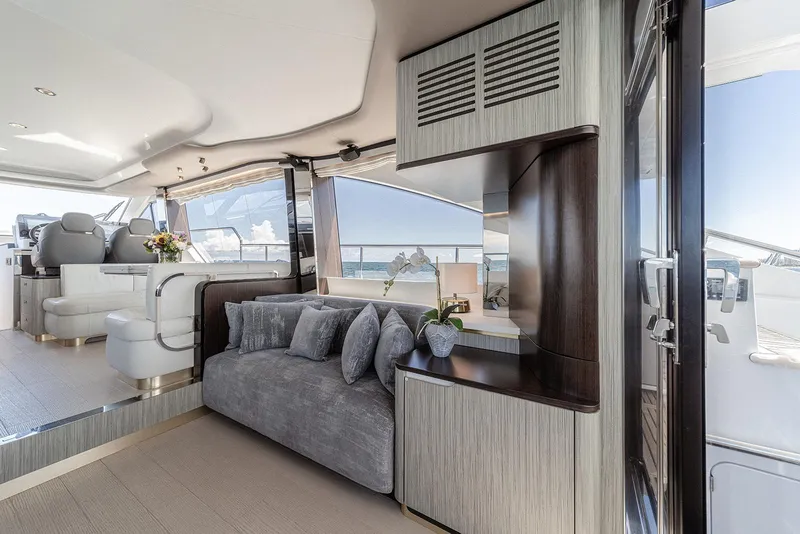 Slide: The Image of Luxurious interior of 2020 Azimut 60 yacht with elegant seating and modern decor. - 24