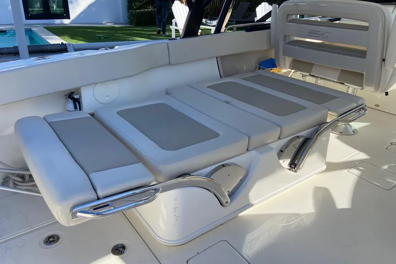 Slide: The Image of 2024 Boston Whaler 320 Vantage boat interior with adjustable seating and sleek design. - 21
