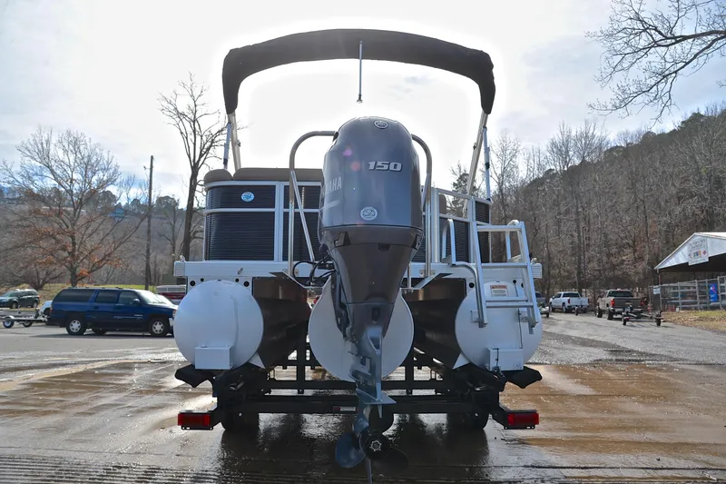 Slide: The Image of 2019 Bennington 21 SSX pontoon boat with Yamaha 150 engine on trailer. - 13