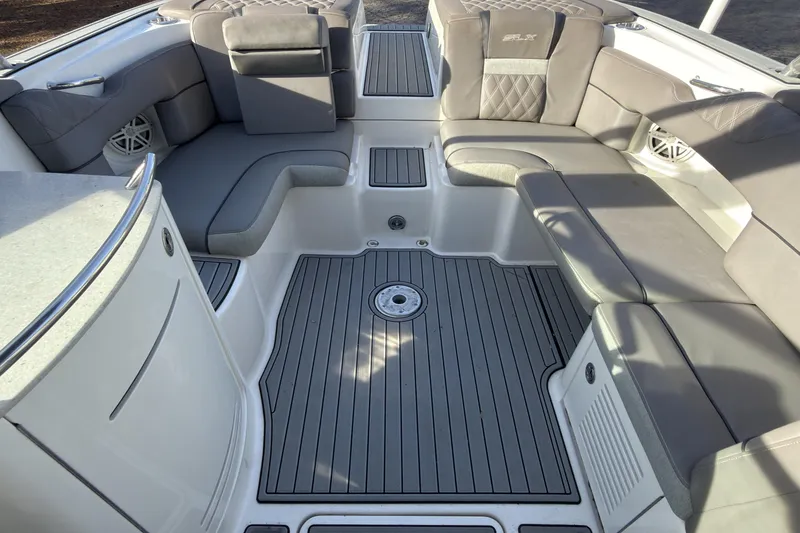 Slide: The Image of 2008 Sea Ray 270 SLX boat interior with gray seating and sleek design. - 15