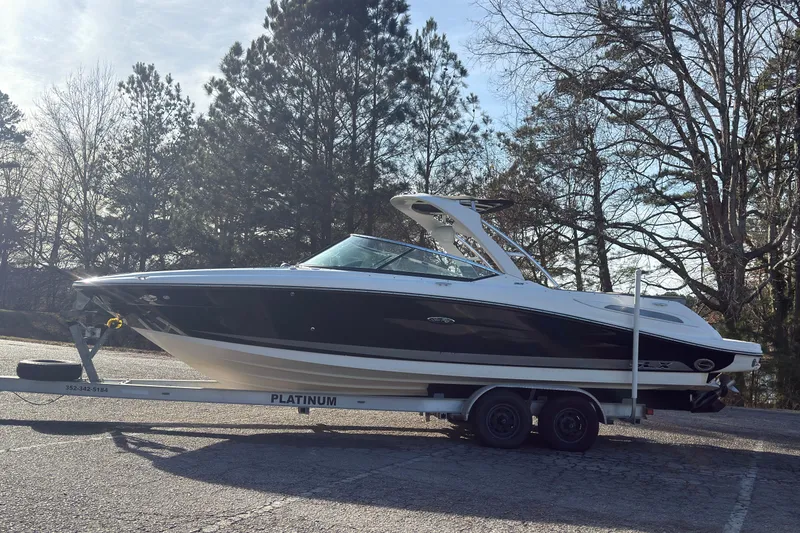 Slide: The Image of 2008 Sea Ray 270 SLX boat on trailer outdoors. - 4