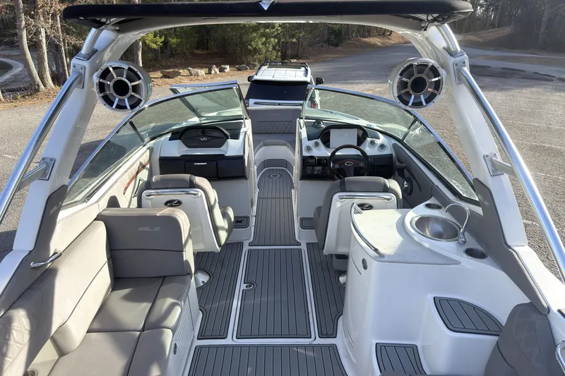 Slide: The Image of 2008 Sea Ray 270 SLX boat interior with seating, steering wheel, and sink. - 5