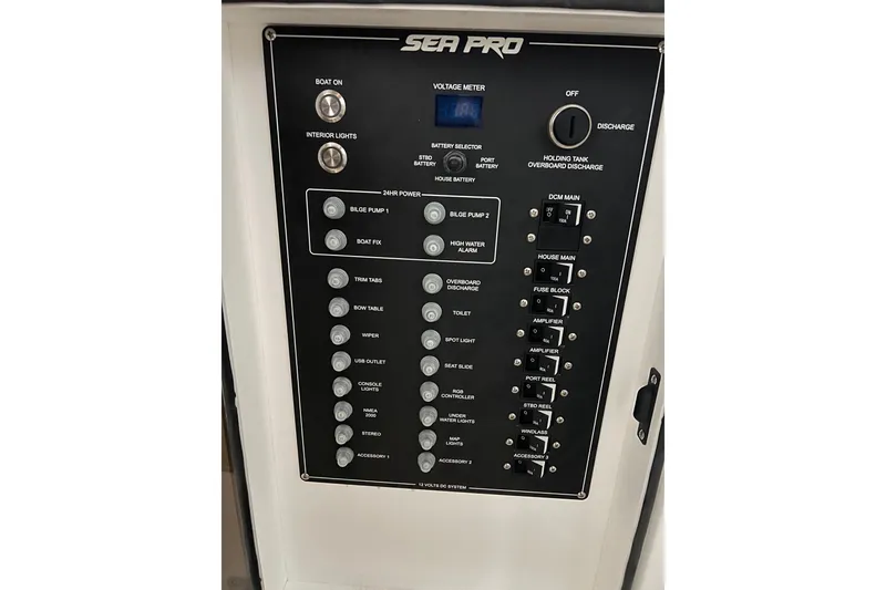 Slide: The Image of Control panel of 2025 Sea Pro 322 Offshore boat with various switches and indicators. - 7