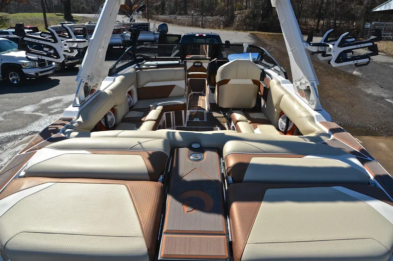 Slide: The Image of 2023 Centurion Ri230 boat interior with luxurious seating and modern design. - 20