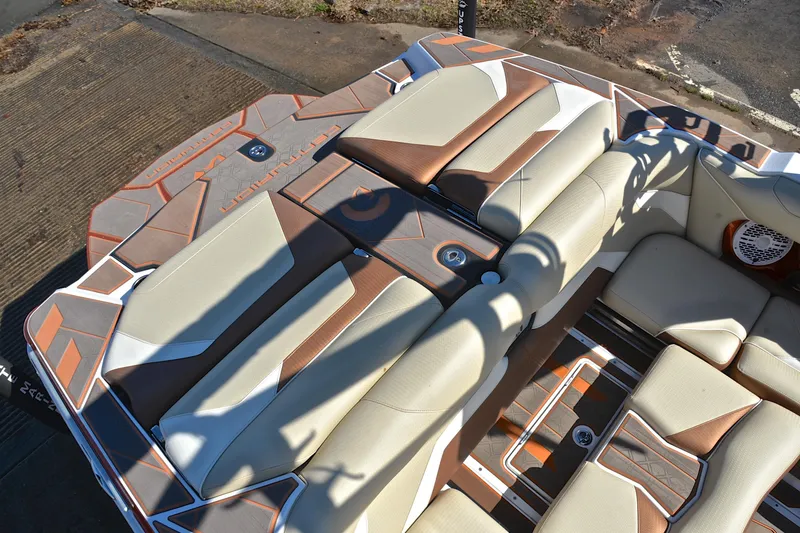 Slide: The Image of 2023 Centurion Ri230 boat interior with stylish seating and modern design. - 25