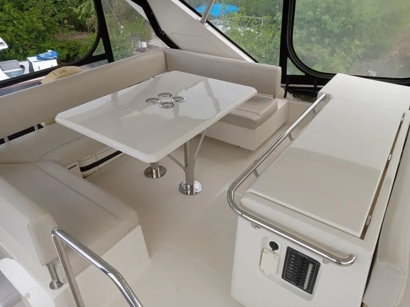 Slide: The Image of Luxurious interior of 2016 Aquila 44 yacht with elegant seating and table. - 15