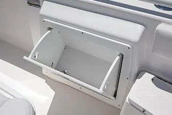 Slide: The Image of Manufacturer Provided Image: Open storage compartment on a 2020 Everglades 243 Center Console boat. - 14