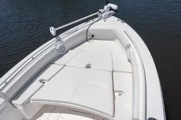 Slide: The Image of Manufacturer Provided Image: 2020 Everglades 243 Center Console boat bow area with seating and trolling motor. - 7