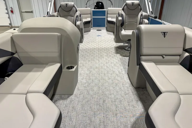 Slide: The Image of Luxurious interior of 2025 Trifecta 22 RF LE pontoon boat with plush seating. - 13