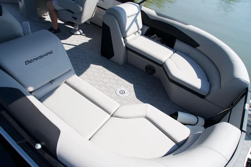 Slide: The Image of 2026 Berkshire 22 RFX LE pontoon boat interior with luxurious seating and modern design. - 5