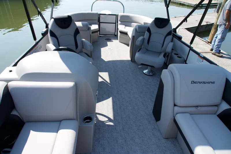 Slide: The Image of 2026 Berkshire 22 RFX LE pontoon boat interior with luxurious seating and modern design. - 9
