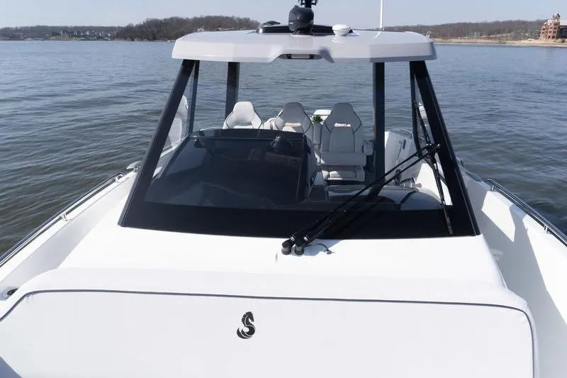 Slide: The Image of 2026 Beneteau Gran Turismo 35 yacht on calm water, showcasing sleek design and modern features. - 26