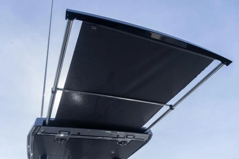Slide: The Image of Beneteau Gran Turismo 35 2026 retractable sunroof against clear sky. - 27