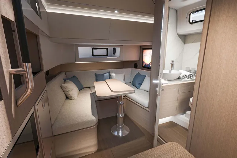 Slide: The Image of Manufacturer Provided Image: Luxurious interior of 2025 Beneteau Gran Turismo 35 yacht with modern seating and bathroom. - 7