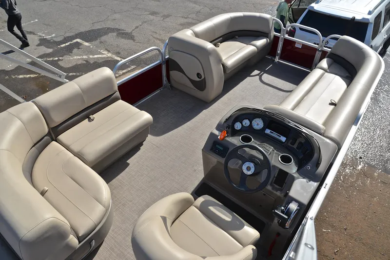 Slide: The Image of 2023 Sun Tracker Party Barge 18 DLX with spacious seating and modern dashboard. - 19