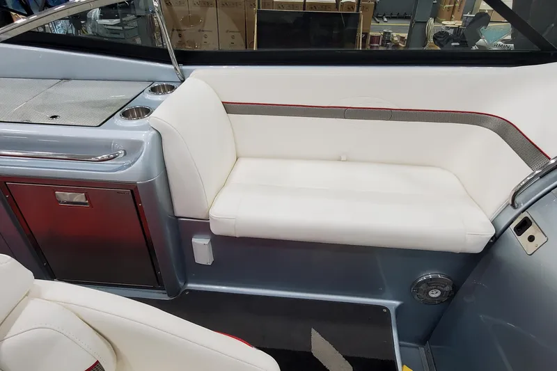 Slide: The Image of 2011 Formula 310 FX5 Bowrider seat with storage compartment open. - 18