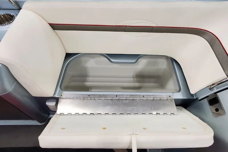 Slide: The Image of 2011 Formula 310 FX5 Bowrider interior with white leather seating and sleek dashboard design. - 19