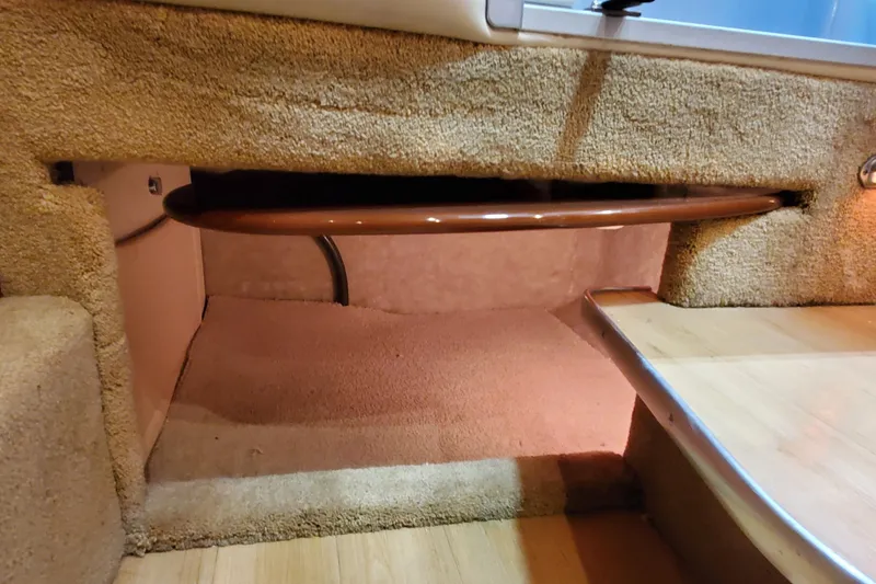 Slide: The Image of 2011 Formula 310 FX5 Bowrider bathroom with sink, toilet, and storage. - 28